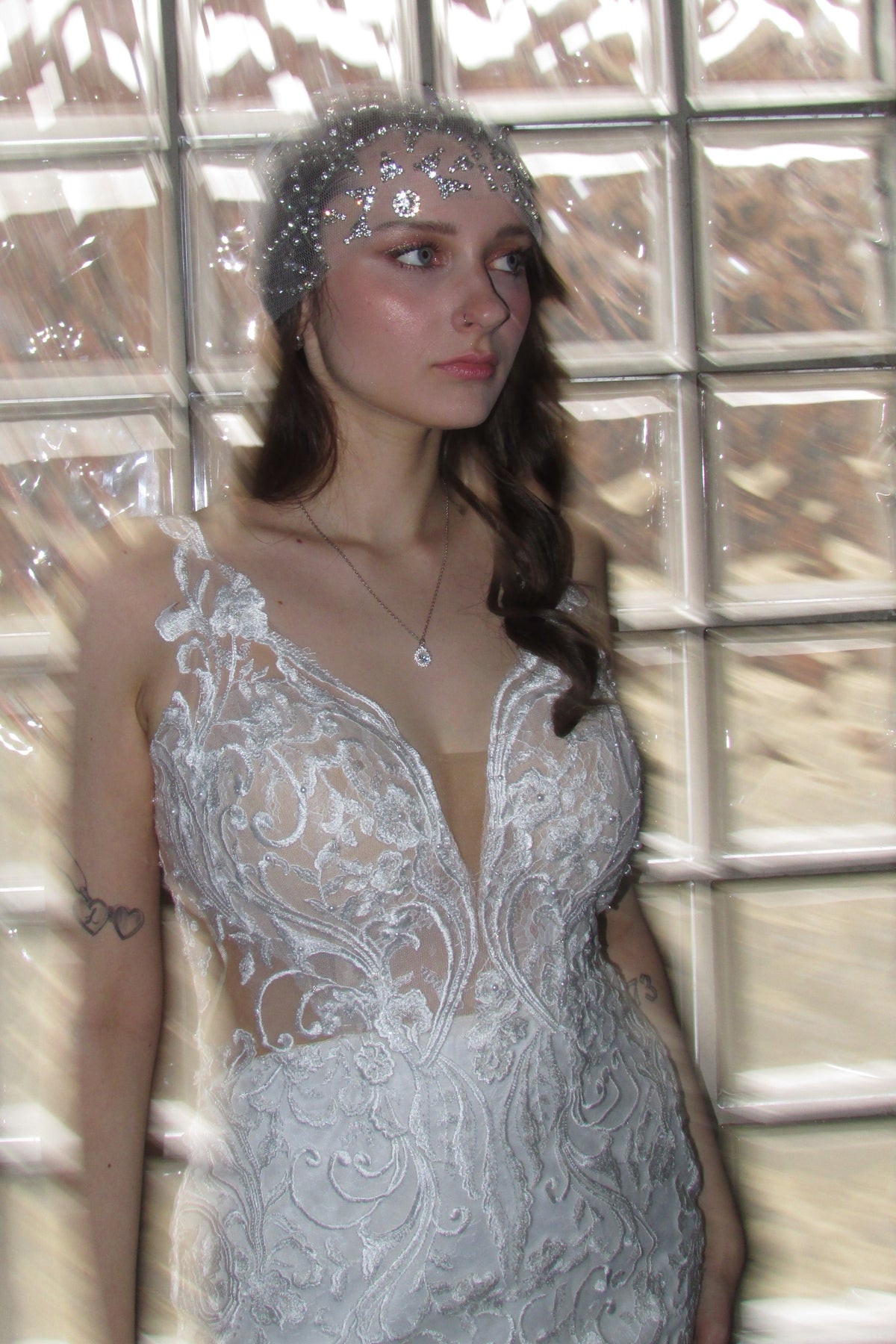 Wedding dress with plunging neckline and 3D lace – couture made to measure