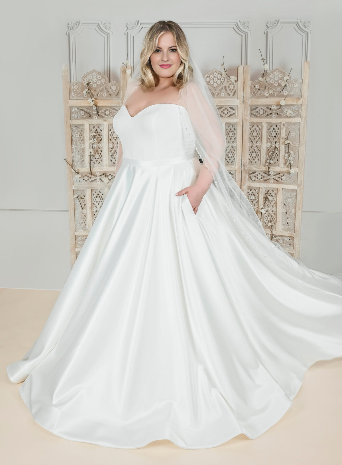 Off-shoulder curvy A-line wedding dress – bespoke plus-size bridal wear