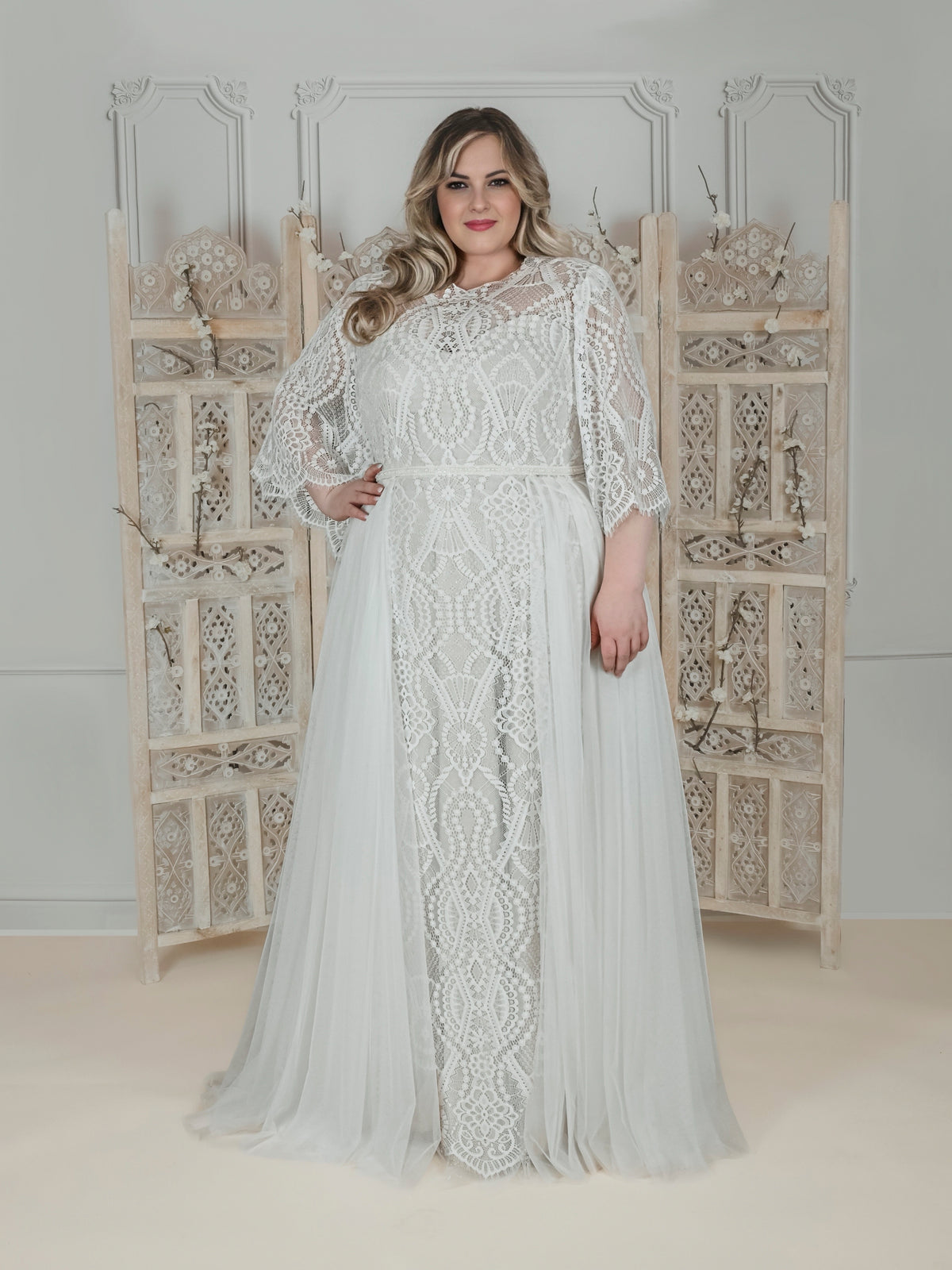 Curvy wedding dress with lace bodice and sleeves – plus-size bridal wear